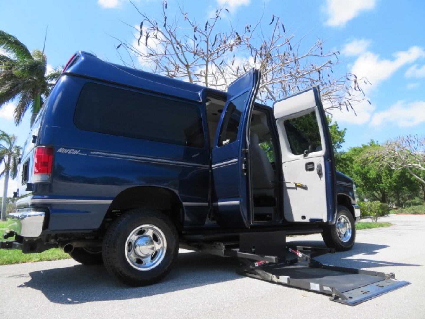 2011 Dark Blue /Gray Ford E-Series Wagon E-350 XLT Super Duty (1FBNE3BS4BD) with an 6.8L V10 SOHC 20V engine, located at 4301 Oak Circle #19, Boca Raton, FL, 33431, (954) 561-2499, 26.388861, -80.084038 - You are looking at a Gorgeous 2011 Ford Econoline E350 XLT Norcal Max High Top Handicap Wheelchair Conversion Van with 6.8L V10, 15K Original Miles, 9 Inch Lowered Floor, Braun UVL Side Entry Wheelchair Lift, Remote Control Power Side Entry Doors, Expanded Side Entry Doors, Q Straint Tie Down, Syste - Photo#50